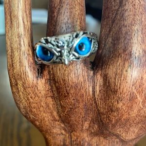 A blue eyed owl ring